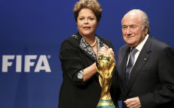 Brazil's President Rousseff poses with FIFA President Blatter after delivering a statement at the FIFA headquarters in Zurich